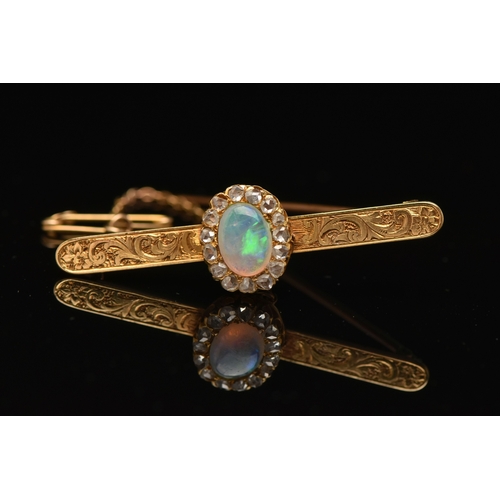 419 - A BOXED OPAL AND DIAMOND BAR BROOCH, designed as an oval cluster set with a central oval cut white o... 