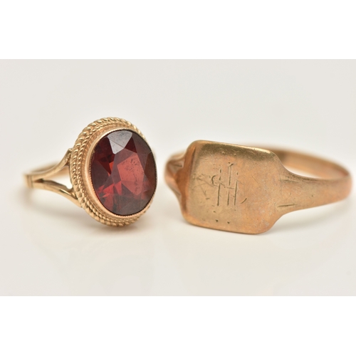 431 - TWO 9CT GOLD RINGS, the first set with an oval cut garnet, hallmarked 9ct Birmingham, ring size D 1/... 