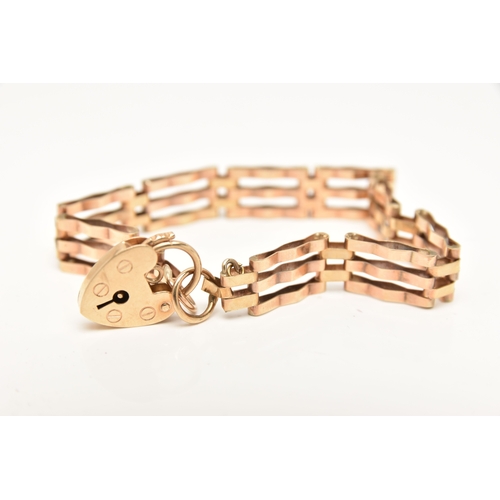 436 - A 9CT GOLD GATE BRACELET, three bar bracelet, approximate width 9.2mm, fitted with a heart padlock c... 
