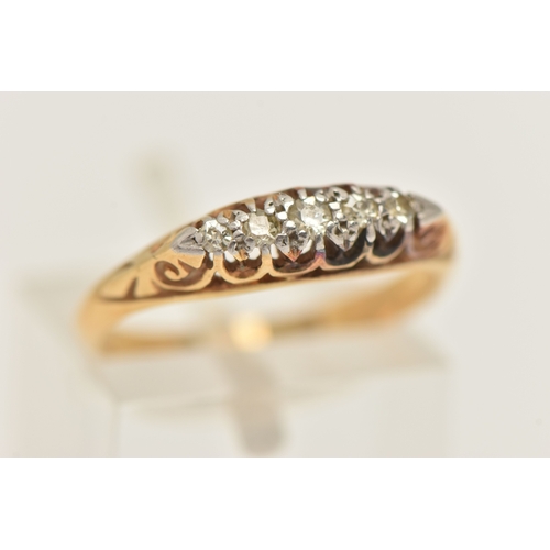 452 - A YELLOW METAL DIAMOND BOAT RING, one small round brilliant cut diamond and four single cut diamonds... 