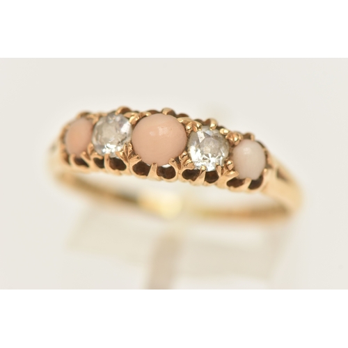 466 - A LATE VICTORIAN 18CT GOLD CORAL AND DIAMOND RING, set with three circular cut coral cabochons, inte... 