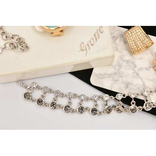 474 - A 'GROSSE' NECKLACE AND EARRINGS, a white metal statement necklace, bezel set with colourless and gr... 