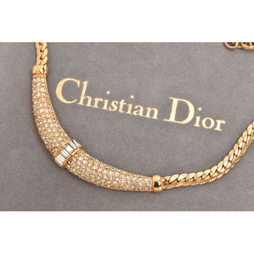 478 - A 'CHRISTIAN DIOR' NECKLACE, a yellow metal flat link chain set with circular cut and baguette cut c... 