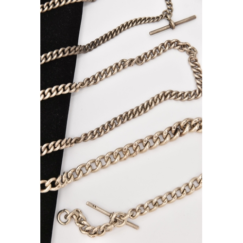 514 - THREE SILVER ALBERT CHAINS, a large graduated curb link chain fitted with a lobster clasp and T-bar,... 