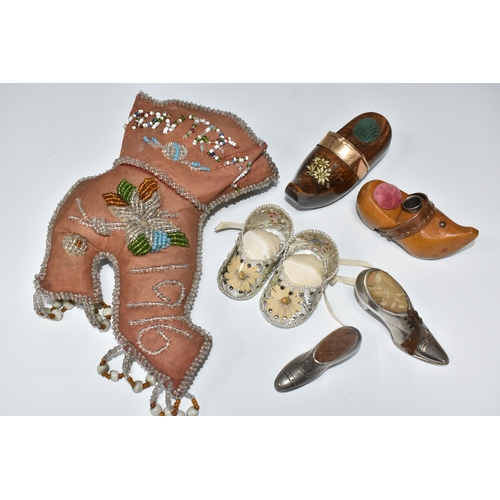 808 - A BOX OF SEWING RELATED ITEMS, comprising a beaded pincushion in the form of a boot, reading 'Montre... 