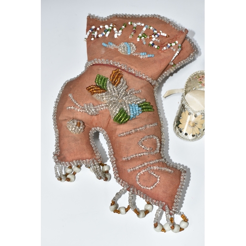 808 - A BOX OF SEWING RELATED ITEMS, comprising a beaded pincushion in the form of a boot, reading 'Montre... 