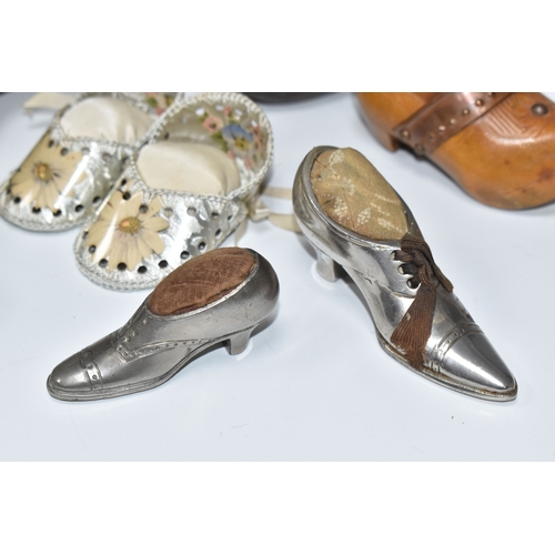 808 - A BOX OF SEWING RELATED ITEMS, comprising a beaded pincushion in the form of a boot, reading 'Montre... 