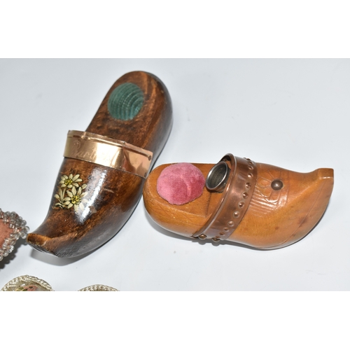 808 - A BOX OF SEWING RELATED ITEMS, comprising a beaded pincushion in the form of a boot, reading 'Montre... 