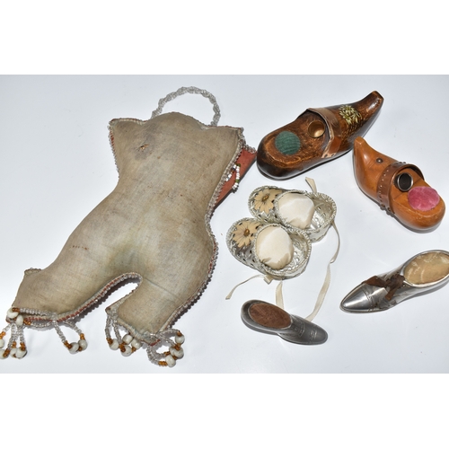 808 - A BOX OF SEWING RELATED ITEMS, comprising a beaded pincushion in the form of a boot, reading 'Montre... 