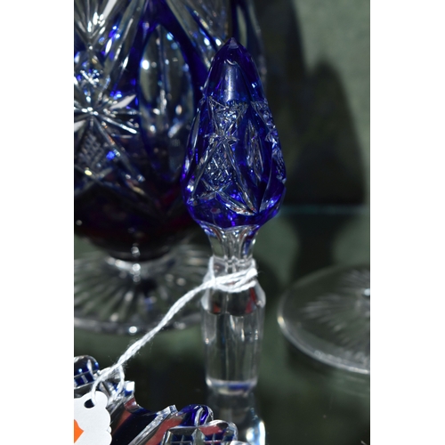 810 - A GROUP OF BLUE CUT TO CLEAR GLASSWARE, possibly Bohemian, to include a decanter of footed form, hei... 