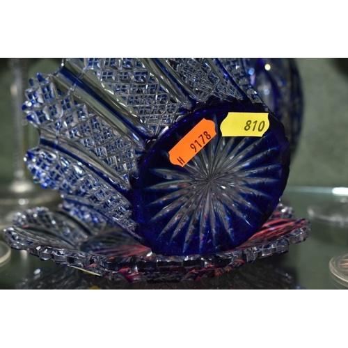 810 - A GROUP OF BLUE CUT TO CLEAR GLASSWARE, possibly Bohemian, to include a decanter of footed form, hei... 