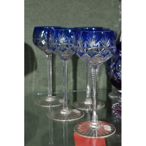 810 - A GROUP OF BLUE CUT TO CLEAR GLASSWARE, possibly Bohemian, to include a decanter of footed form, hei... 
