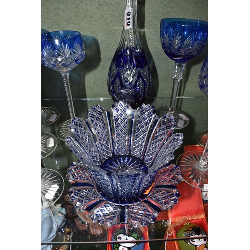 810 - A GROUP OF BLUE CUT TO CLEAR GLASSWARE, possibly Bohemian, to include a decanter of footed form, hei... 