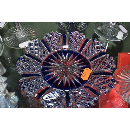 810 - A GROUP OF BLUE CUT TO CLEAR GLASSWARE, possibly Bohemian, to include a decanter of footed form, hei... 