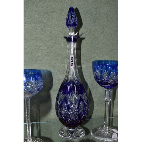 810 - A GROUP OF BLUE CUT TO CLEAR GLASSWARE, possibly Bohemian, to include a decanter of footed form, hei... 