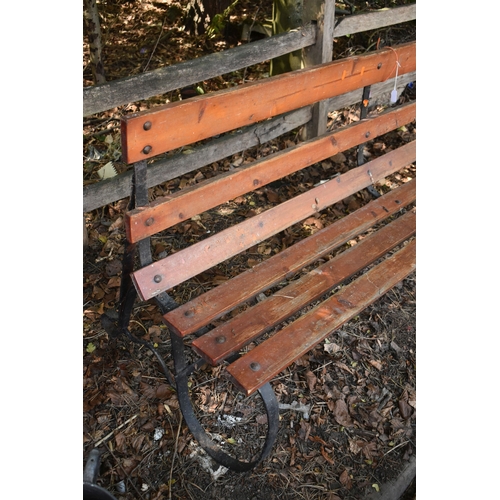 2 - A WROUGHT IRON STRAPWORK BENCH, with pine slats, length 185cm, condition report: solid frame, some r...