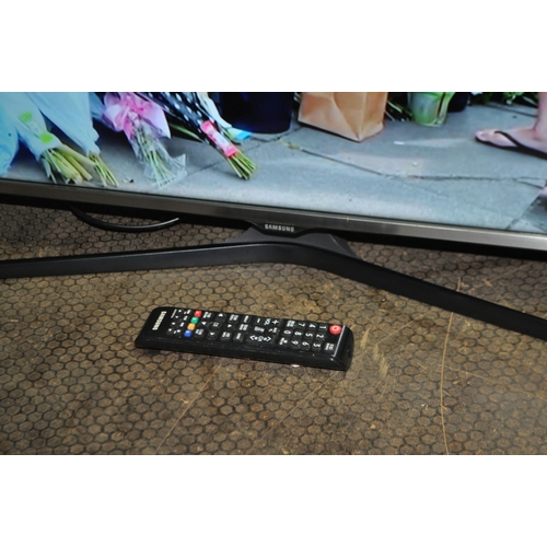 51 - A SAMSUNG UE32J6100 32in TV with remote (PAT pass and working)...