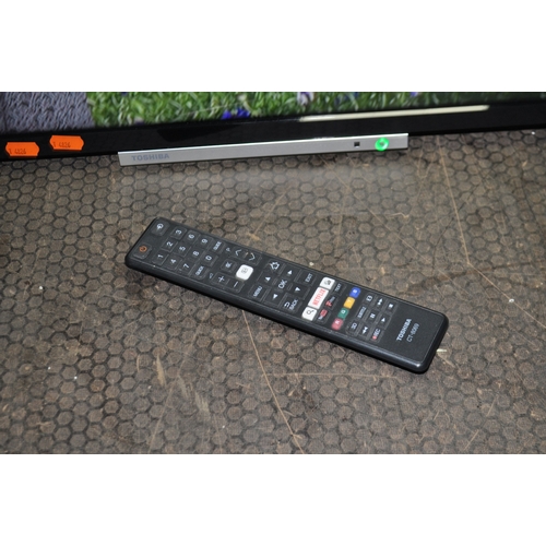 52 - A TOSHIBA 24W38630D 24in SMART TV with remote and wall bracket fitted (no stand) and a Toshiba 24W37...