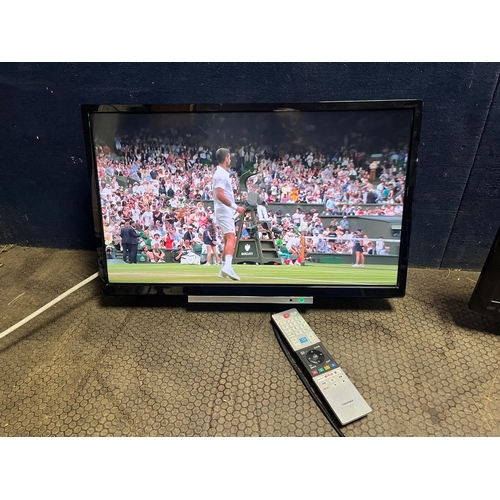 52 - A TOSHIBA 24W38630D 24in SMART TV with remote and wall bracket fitted (no stand) and a Toshiba 24W37...
