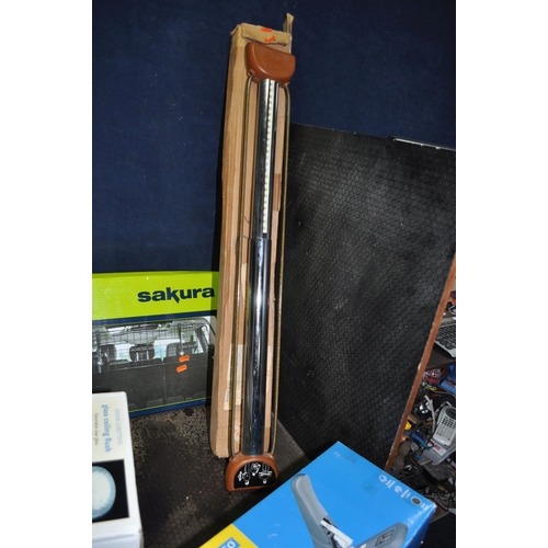 69 - A COLLECTION OF HOUSEHOLD ITEMS including four staplers, six internal and external light fitting, a ...