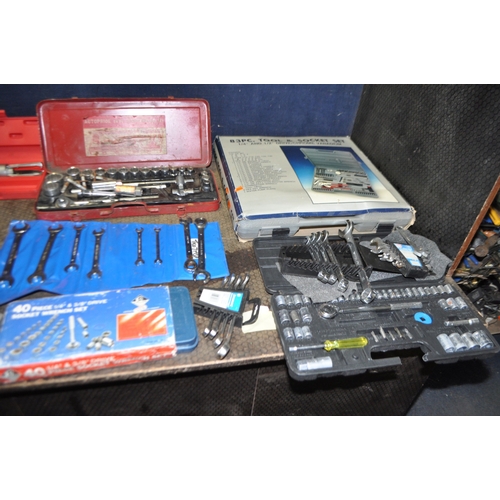 79 - A COLLECTION OF AUTOMOTIVE TOOLS including socket sets, spanners, a Record 24 stilson, a bearing pul...