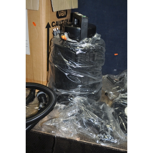 89 - A VAX 25-042 WET AND DRY VACUUM (appears to be brand new in tatty opened box) (PAT pass and working)...