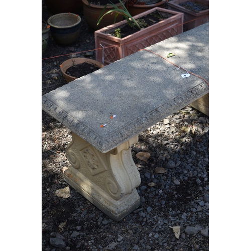 9 - A COMPOSITE RECTANGULAR GARDEN BENCH, on twin scrolled ends, length 109cm, condition report: some sm...