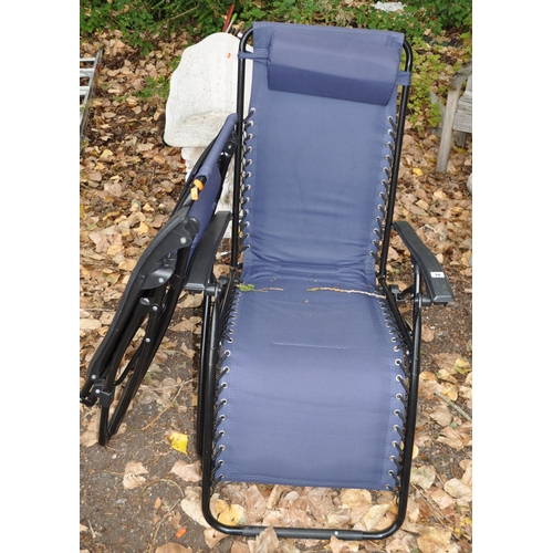 16 - A PAIR OF METAL FRAMED FOLDING SUN LOUNGERS with leg support