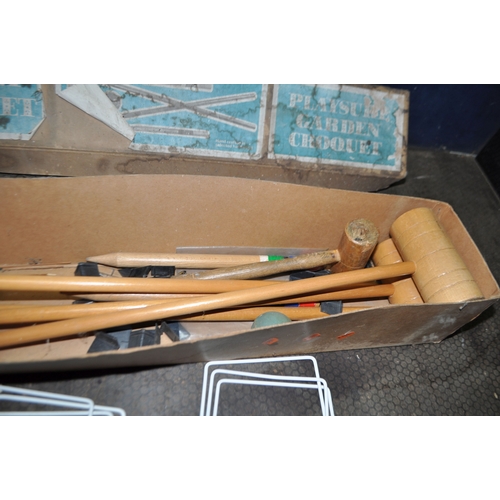 54 - A PLAYSURE GARDEN CROQUET SET with four mallets, six hoops, four balls and two stakes