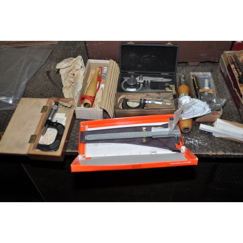 61 - A VINTAGE WOODEN BOX  CONTAINING ENGINEERING TOOLS AND TEST EQUIPMENT including micrometers, dial ga... 