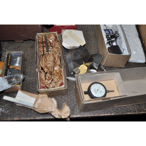 61 - A VINTAGE WOODEN BOX  CONTAINING ENGINEERING TOOLS AND TEST EQUIPMENT including micrometers, dial ga... 