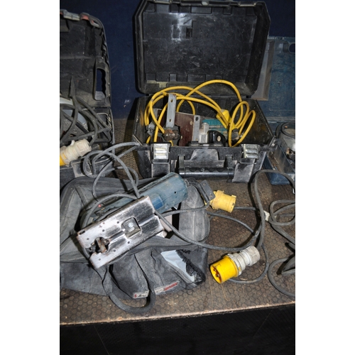 80 - A COLLECTION OF 110V POWER TOOLS including two Bosch jigsaw, a Makita router and electric planer, a ... 