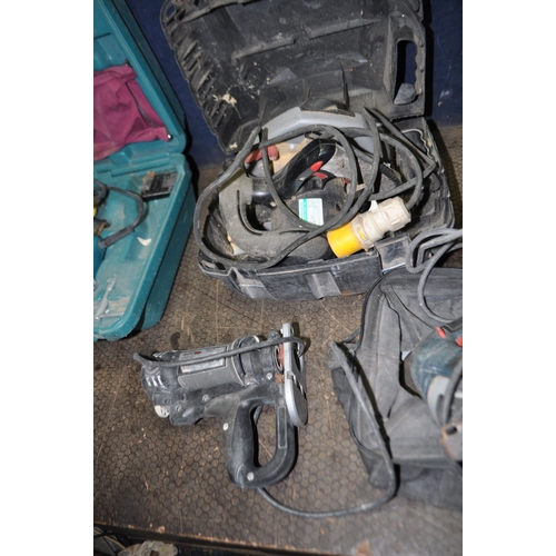 80 - A COLLECTION OF 110V POWER TOOLS including two Bosch jigsaw, a Makita router and electric planer, a ... 