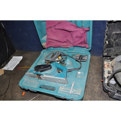 80 - A COLLECTION OF 110V POWER TOOLS including two Bosch jigsaw, a Makita router and electric planer, a ... 