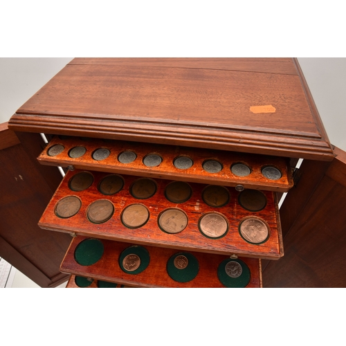 A WOODEN COIN CABINET CONTAINING MULTIPLE DRAWERS (40), to include ...
