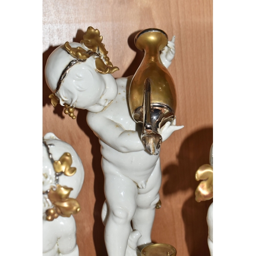 841 - THREE GIUSEPPE CALLÉ CAPODIMONTE FIGURES OF CHERUBS, the porcelain figures wearing gilt and silver l... 