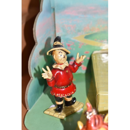 843 - FIVE ARORA DESIGN HIDDEN TREASURES THE WIZARD OF OZ TRINKET BOXES, with display stand, enamel trinke... 