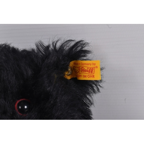 262 - TWO STEIFF CLASSIC TEDDY BEARS, the first a a Titanic Mouring bear replica 1912, no. 003509, yellow ...