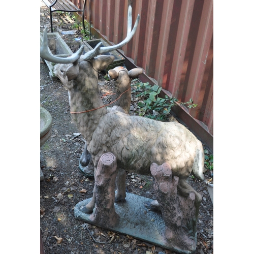 12 - A SET OF TWO GARDEN STATUES, of deer's with interchangeable ears / antlers, one is standing, the oth... 