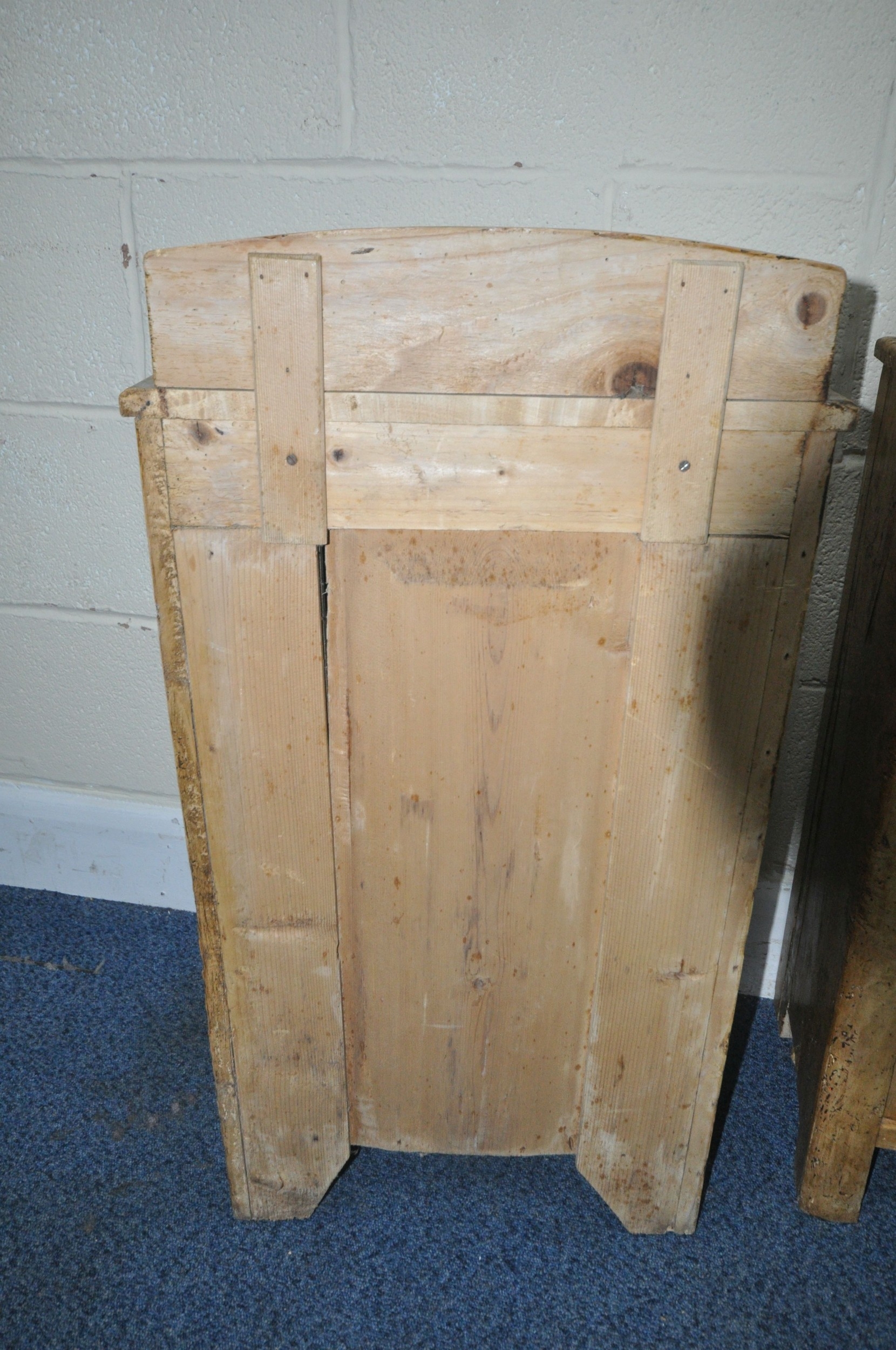 AN OPPOSING PAIR OF SCUMBLED PINE BEDSIDE CABINETS, with a later raised ...