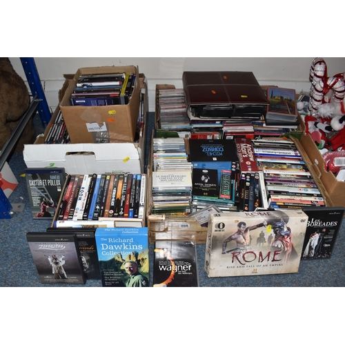 FOUR BOXES AND A FOLDER OF DVDS, CDS, ETC to include a large collection ...