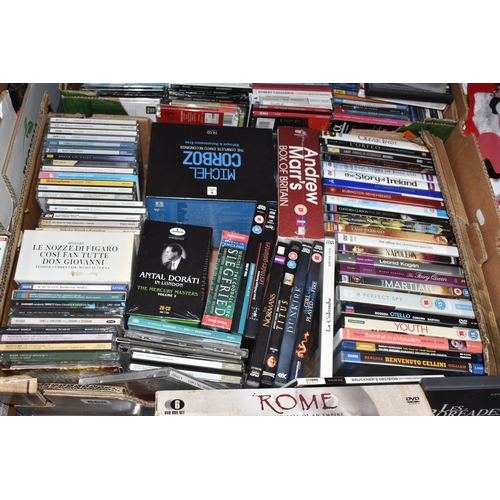 FOUR BOXES AND A FOLDER OF DVDS, CDS, ETC to include a large collection ...