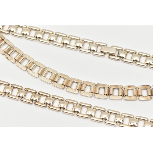 A SILVER NECKLACE AND BRACELET SET, designed as a collar style fancy ...