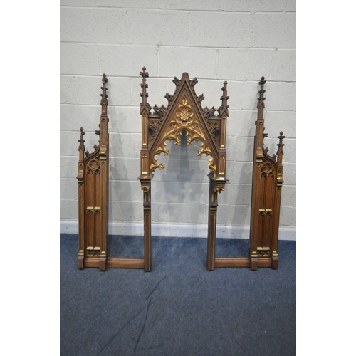 A 20TH CENTURY OAK ECCLESIASTICAL REREDOS, with gilt details, carved ...