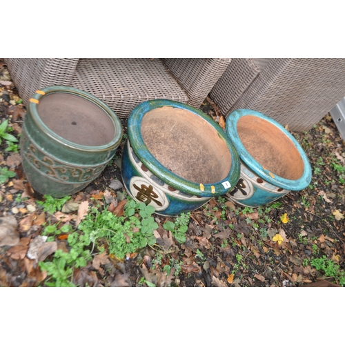 7 - THREE GLAZED GARDEN PLANT POTS including a pair with Chinese characters to bowl, 42cm in diameter (3... 