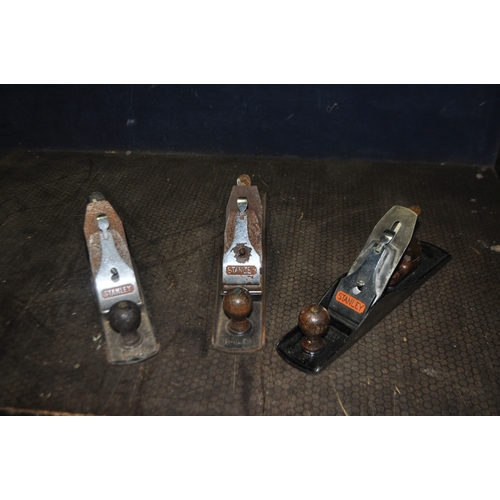85 - THREE STANLEY WOODWORKING PLANES comprising of two No.5 1/2 and a No 6
