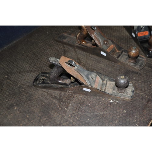 85 - THREE STANLEY WOODWORKING PLANES comprising of two No.5 1/2 and a No 6
