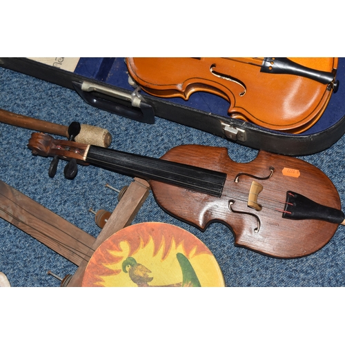 A GROUP OF INTERNATIONAL STRINGED INSTRUMENTS comprising a Polish ...