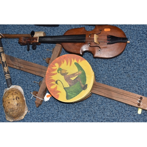 A GROUP OF INTERNATIONAL STRINGED INSTRUMENTS comprising a Polish ...