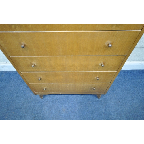 152 - LEBUS, A MID CENTURY TOLA CHEST OF FIVE DRAWERS, with raised back and sides, on tapered legs, width ... 